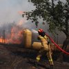 Două localități din Grecia au fost evacuate din calea unui incendiu de vegetație izbucnit în apropiere de Atena