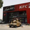 Insurgența fast-food: Cum a provocat, prin ricoșeu, războiul din Gaza un val de atacuri asupra restaurantelor americane din Irak