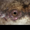 „Trezirea” unei găuri negre, aflate la 360 de milioane de ani-lumină de Pământ, observată pentru prima dată de astronomi