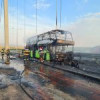 La un pas de tragedie. Un autocar cu 35 de ucraineni a luat foc pe podul peste Dunăre de la Brăila