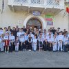 Tineri din Arhiepiscopia Alba Iulia, participanți la Festivalul Internațional de Toacă și Clopote desfășurat în județul Brașov