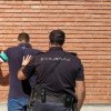 Un român deghizat în polițist, ajutat de complici ruși, a încercat să răpească doi milionari în criptomonede din Spania